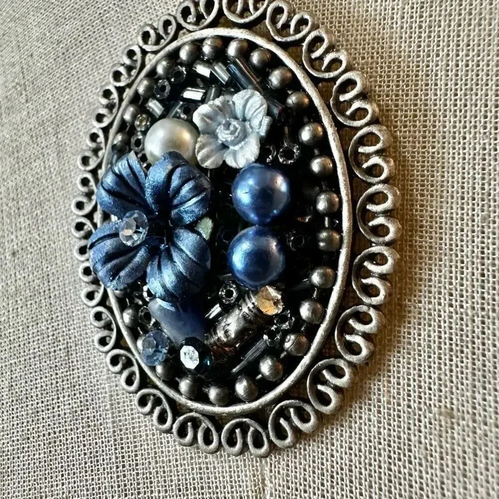 Blue floral beaded pendant necklace on multi cord